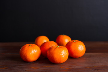mandarin on dark wood