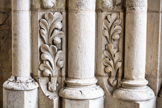 Antique Building's Detail Of White Limestone Pillars Or Columns