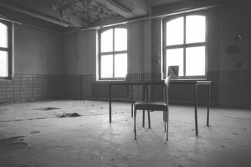 old factory hall with table and chair