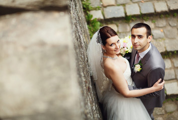 Couple in love near the wall