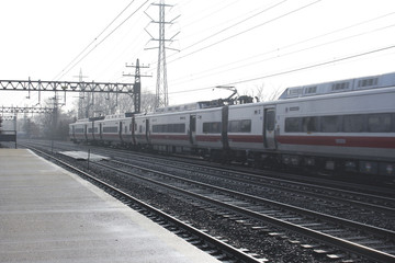 Fototapeta na wymiar Trains going through a train station