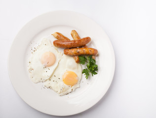 Fried eggs with sausage 