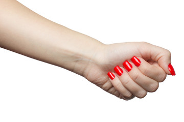 Beautiful female hand with red manicure and nail. woman's fist