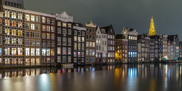 Amsterdam Rokin, old ware houses standing on wooden poles in the canals over 800years