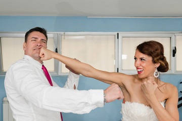 Bride hitting groom