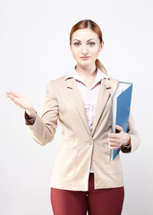 Young business woman with a blue folder. Business, real estate.