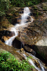 A beautiful waterfall inside tropical rainforest. Long exposure and slow shutter