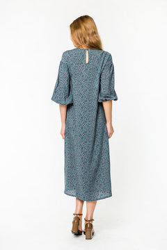 Details of women's clothing. Detail dress on a model on a white background
