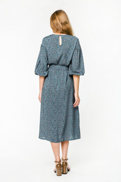 Details of women's clothing. Detail dress on a model on a white background