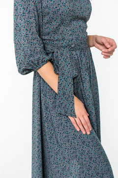 Details of women's clothing. Detail dress on a model on a white background