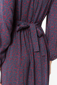 Details of women's clothing. Detail dress on a model on a white background