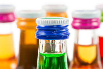 Various isolated liqueur bottles with party drinks