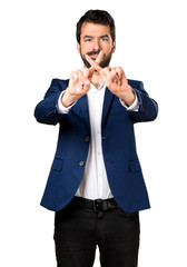 Handsome man making NO gesture