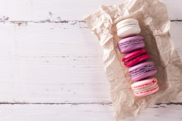 Colorful tasty macaroons in gift box on table,French delicious cake