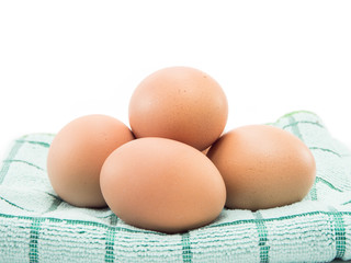 four egg on fabric isolated on white background