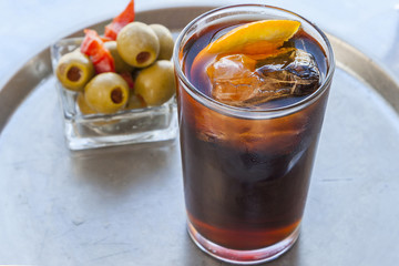 Vermouth, traditional Spanish appetizer with olives