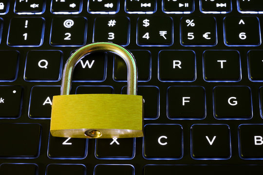 Closed security lock on backlit computer keyboard