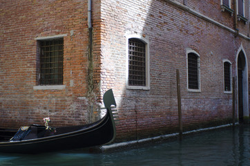 Fototapeta na wymiar View of venice from a gondola on a canal