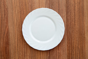 plate on a wooden table.
