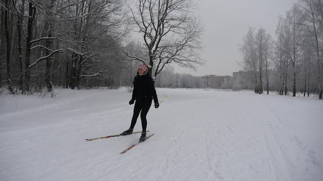 woman Skate Skiing near the forest In Winter Sport