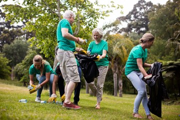 Team of volunteers picking up litter