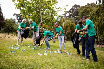 Team of volunteers picking up litter