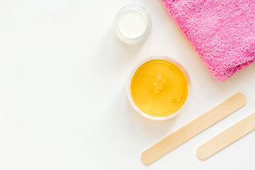 concept depilation with wax on white background top view