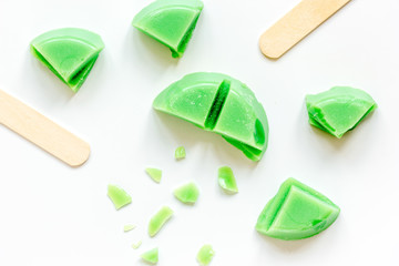 concept depilation with wax on white background top view