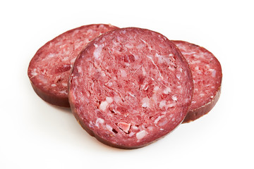Slices of sucuk (sujuk) sausage isolated on white background