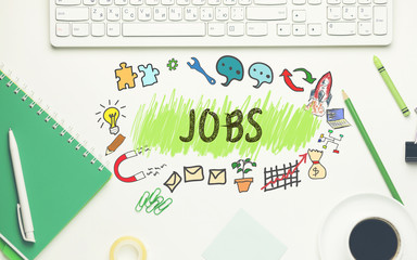 job with keyboard and stationary on table