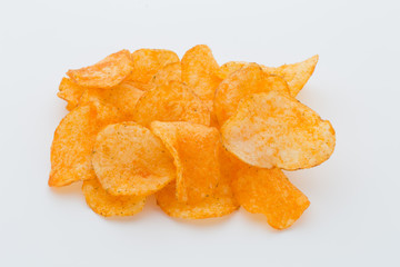 Crisps with paprica on a white background.