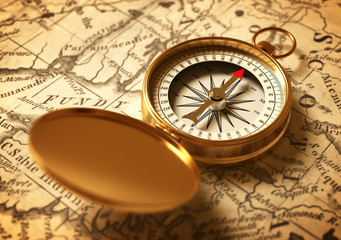 Fototapeta na wymiar Golden Compass On Old Map