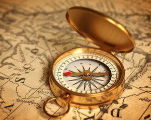 Fototapeta na wymiar Golden Compass On The Map