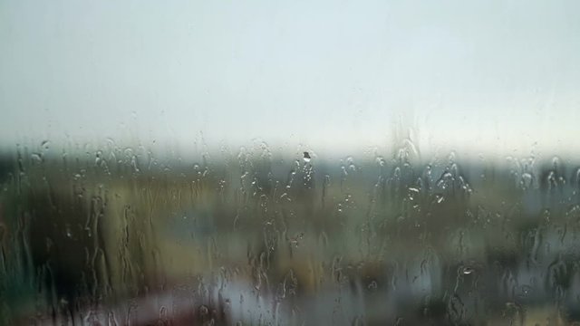 Raindrops on window glass shot