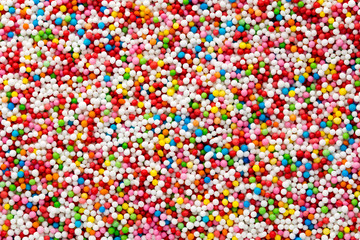 Multicoloured sweet sugar balls. Small ball pattern.