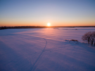 snowy winter field with a bird's-eye view