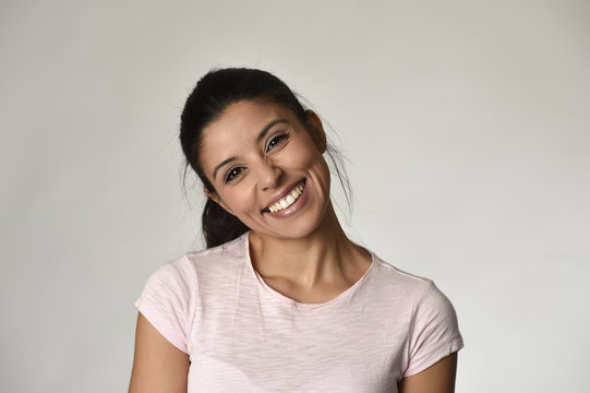 Portrait Of Young Beautiful And Happy Latin Woman With Big Toothy Smile Excited And Cheerful