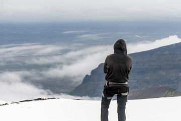 Fototapeta na wymiar Men Hiking glacier Hvannadalshnukur summit in Iceland mountain landscape Vatnajokull park
