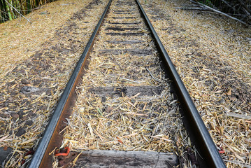 Fototapeta premium Old train track made of steel, wood and stones.