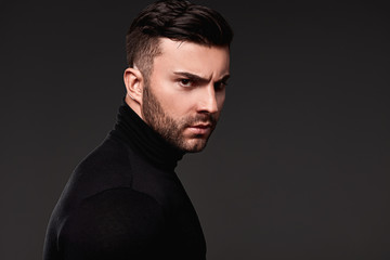 Obraz premium Serious thoughtful handsome man in golf