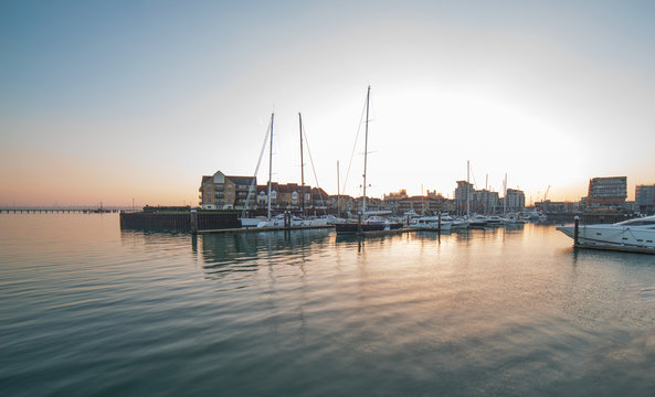 Harbour entrance to Ocean Village Marina in Southampton at sunset