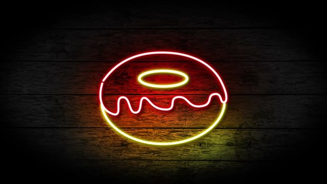 Neon Donuts sign turning on and blinking on grunge wooden wall with copy space, food and drinks sign loop, fast food and health care concept. full hd and 4k.