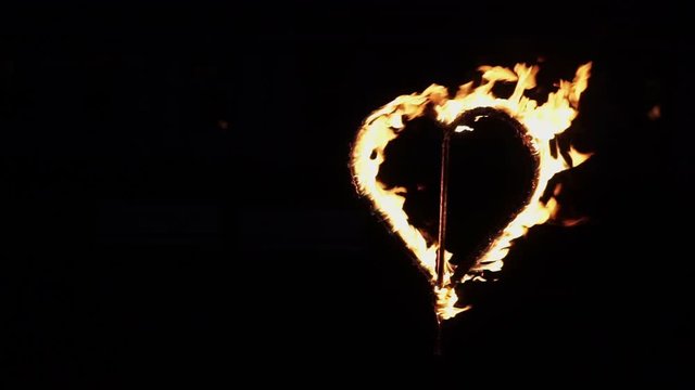 Fire heart flaming at night shot