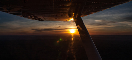 Sunset under wing of a bush plane somewhere in Western Australia