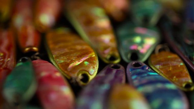 Abalone coated fishing spoons.