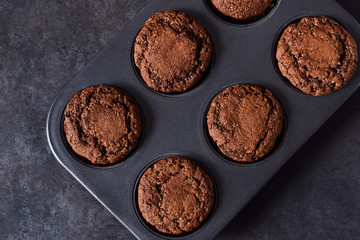 Chocolate muffins, brownies with nuts and chocolate.