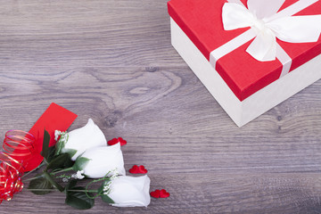 Beautiful roses and a gift box