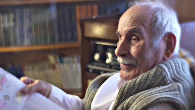 Grandad Shows Kid's Drawings to Visitors Remembers His Grandchildren's Family Gathered Together at Grandfather's Place Vintage Interior of Man's House