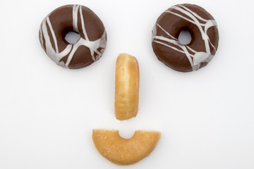 face of happiness with them donuts