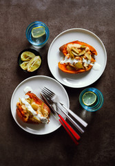 a dish of Sweet potato, baked in the oven, and Hummus with green